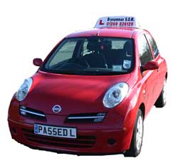 Red Nissan Micra - Reg: PASSED L